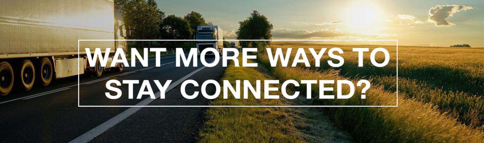 tractor trailers driving at sunset get connected slogan banner